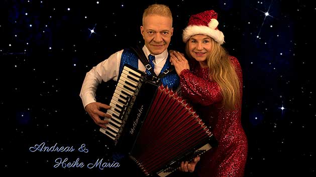 Heike und Andreas in weihnachtlichem Outfit